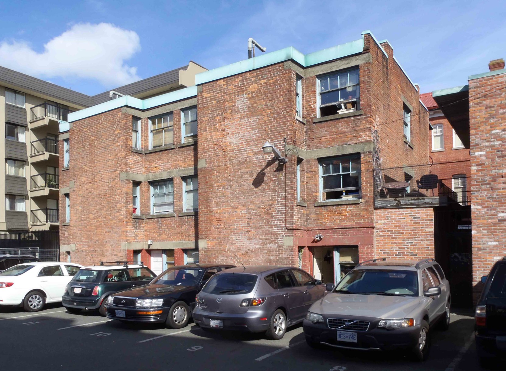 Western side of the tenement building at 624 1/2 Fisgard Street, built in 1913 behind the Gee Tuck Tong Building