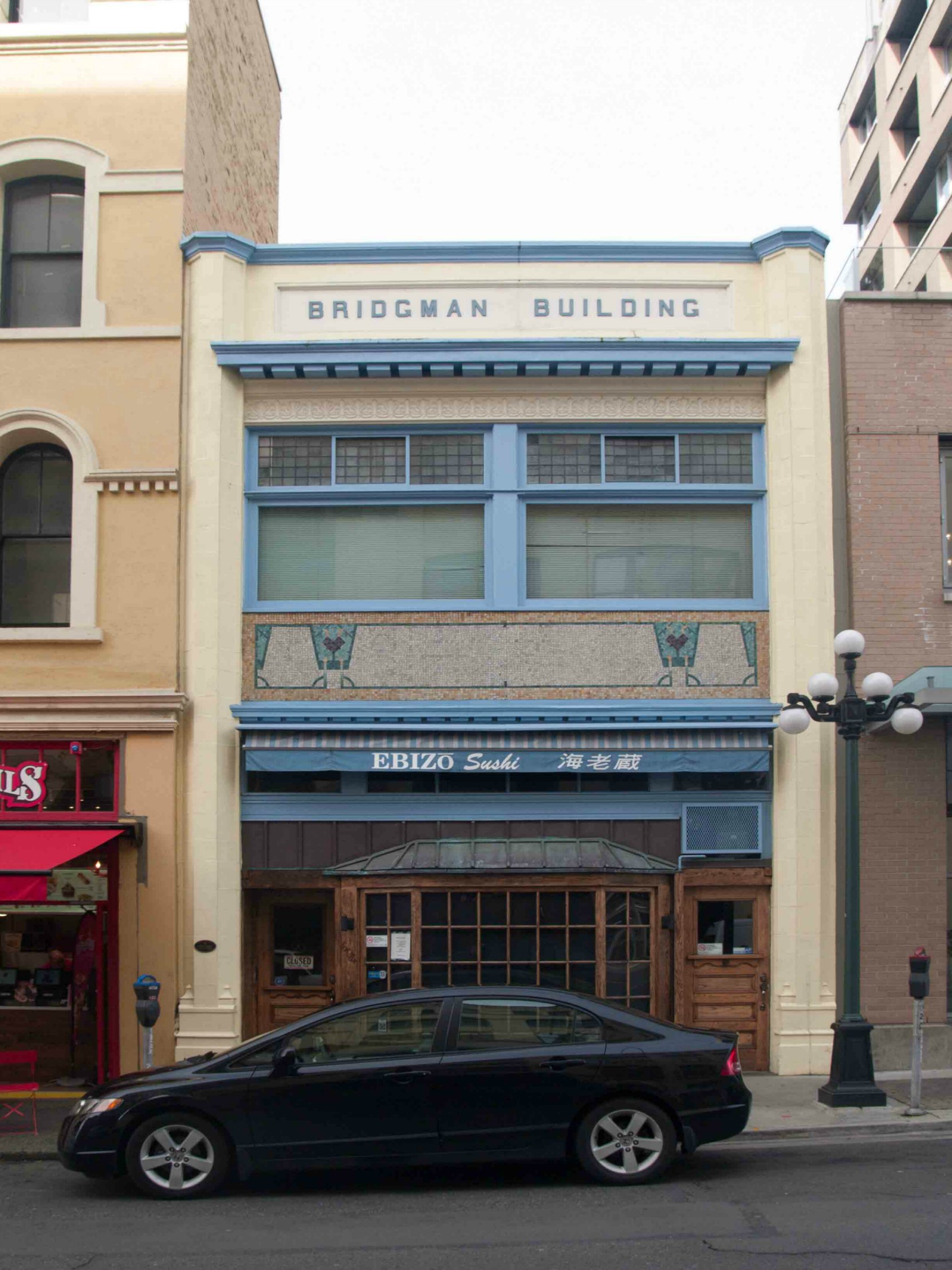 The Bridgman Building at 604 Broughton Street was built in 1885 but its current facade was added in 1910 by architects Percy L. James and Douglas James.