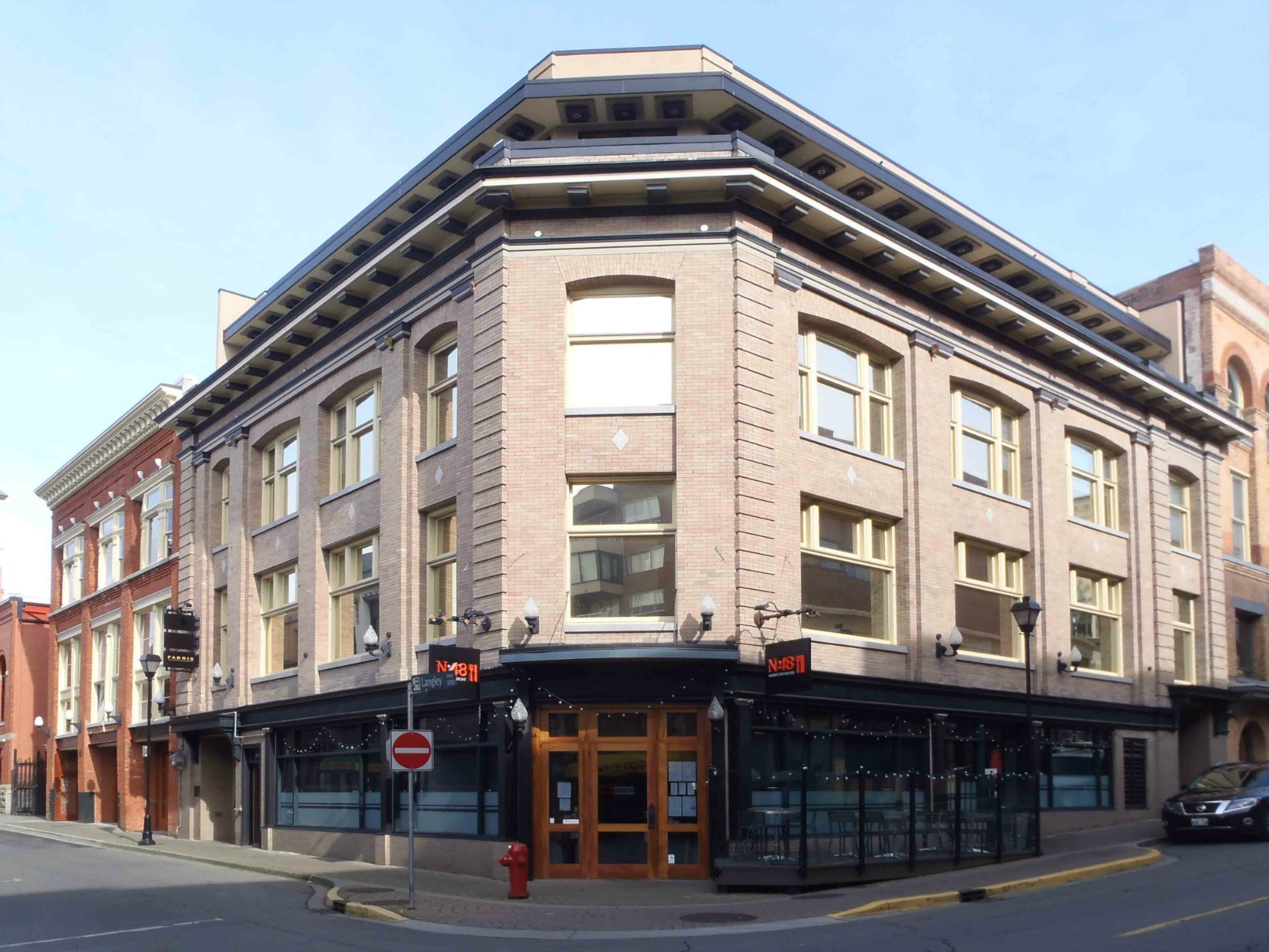 This building at the corner of Broughton Street and Langley Street was designed in 1909 by architect Francis Rattenbury as offices for the B.C. Land & Investment Company.
