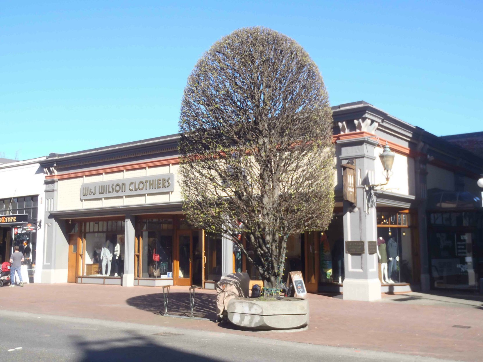 1221 Government Street. The current facade was designed in 1912 by architect William Ridgway Wilson for W & J Wilson, one of Victoria's oldest businesses. The building likely dates from the 1870's. (photo by Victoria Online Sightseeing Tours)