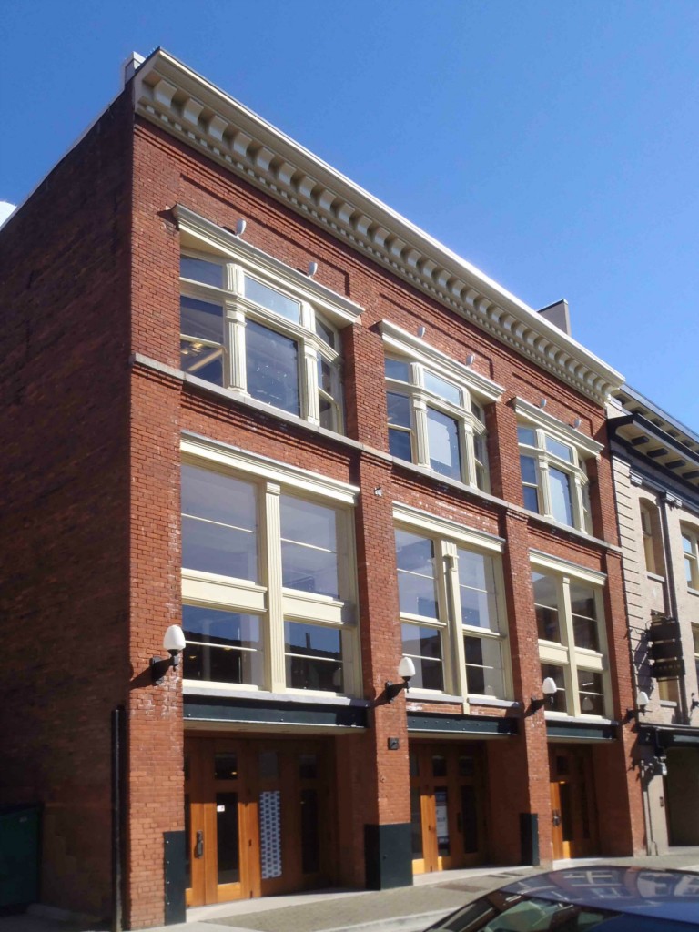 The Langley Street facade of the Promis Block, 1007-1011 Langley Street and 1006-1010 Government Street