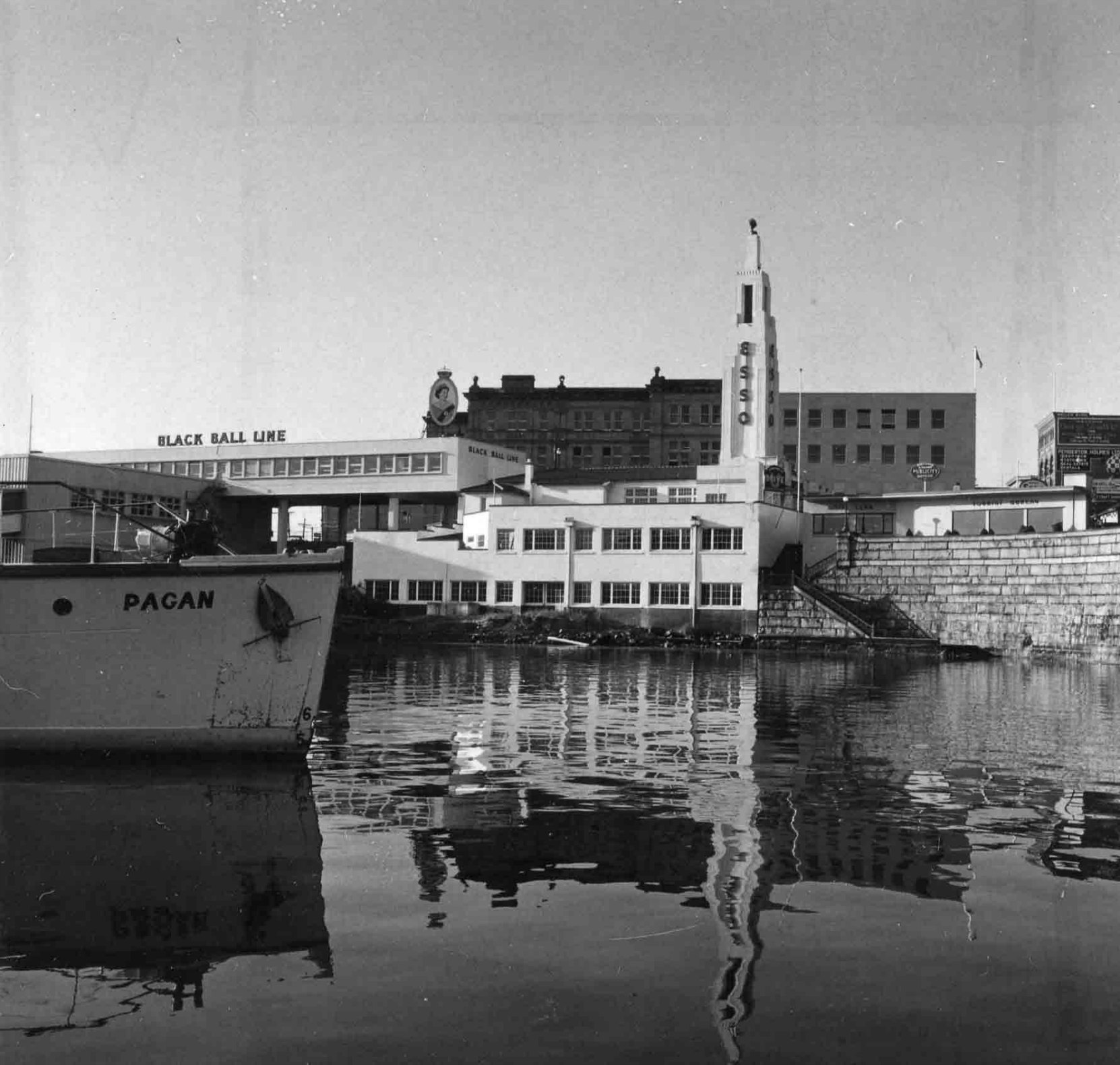 812 Wharf Street in 1958. Note the adjacent Black Ball Line ferry terminal (photo courtesy of Glenbow Museum, used with permission)