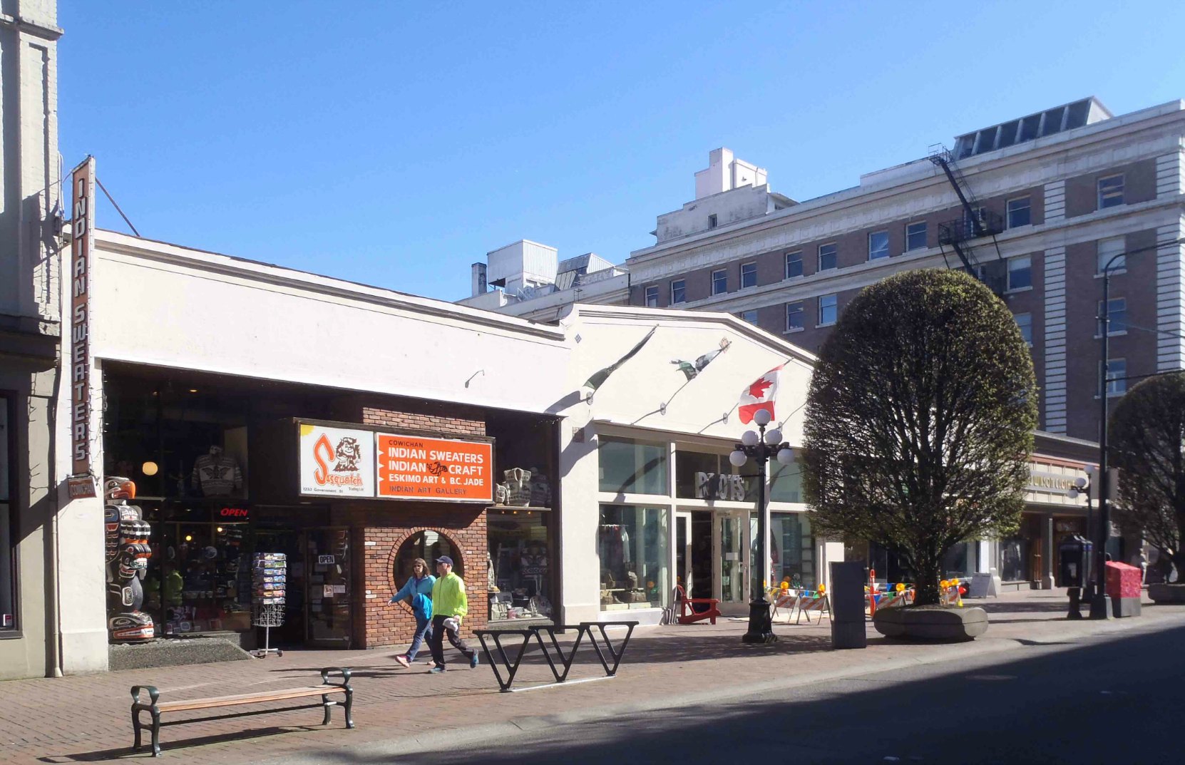 This commercial building at 1223-1233 Government Street was likely built in the late 19th century. It is currently home to Roots (1227 Government) and Sasquatch Trading (1233 Government) (photo by Victoria Online Sightseeing Tours)