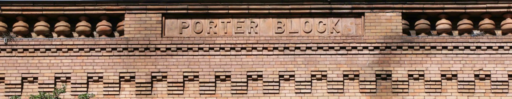 Our web header photo for the Porter Block at 1402-1406 Douglas Street shows the brickwork at the building's cornice.
