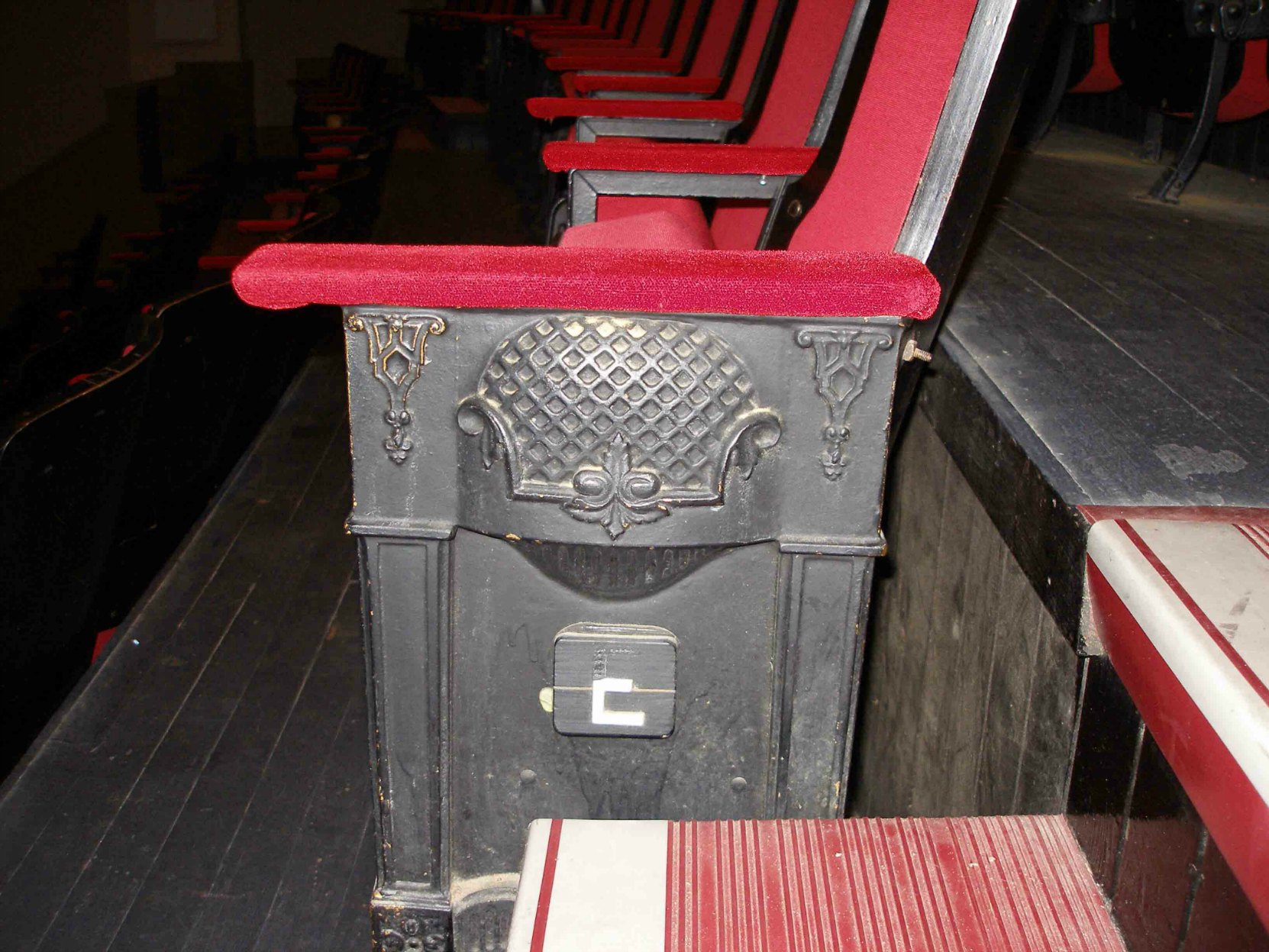 These seating panels are original interior detailing in the McPherson Playhouse, 3 Centennial Square. This theate was built in 1914 by architect Jesse M.Warren and much of its original interior detail is still intact.