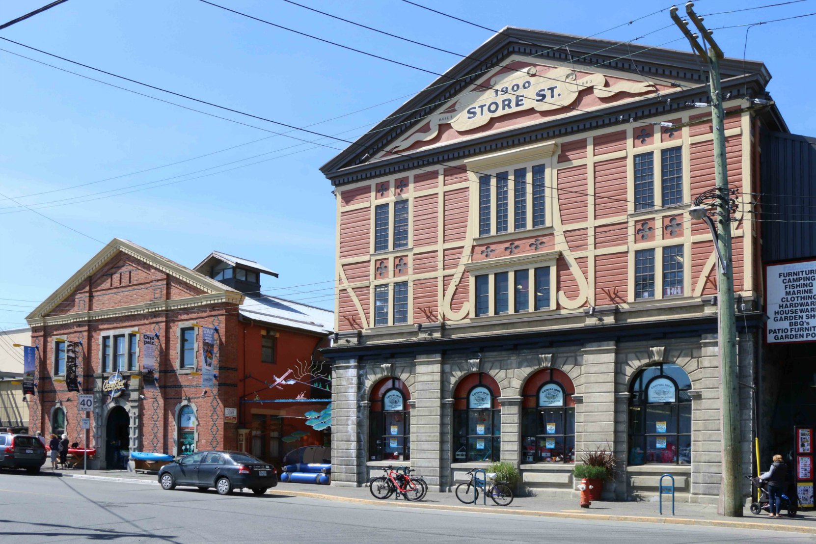 1824 Store Street (left), built in 1890, and 1900 Store Street (right), built in 1862. 