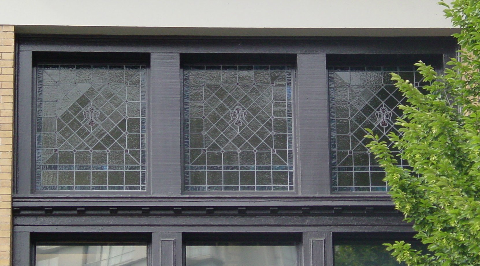 Original window detailing on the front of 716 Courtney Street, built in 1911 as the Alexandra Ladies Club (photo by Victoria Online Sightseeing Tours)