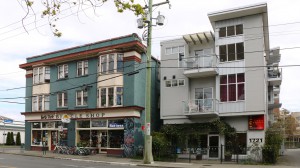 1721 Quadra Street (right), built in 2005, and 1722 Quadra Street, built in 1914. These buildings show the contrast between early 20 and earlier 21st century designs of 3 storey buildings with commercial space on the main floor and apartments on the upper floors.. (photo: Victoria Online Sightseeing Tours Inc.)